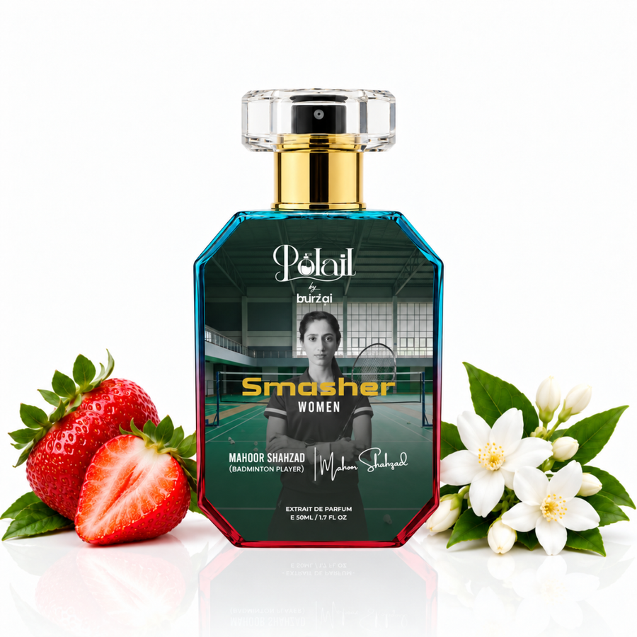 A bottle of Polail by burzai Smasher Women perfume is centered on a white reflective surface, flanked by fresh strawberries on the left and white flowers with green leaves on the right. The bottle has a blue-to-red faceted glass body, a gold neck, and a clear cap.