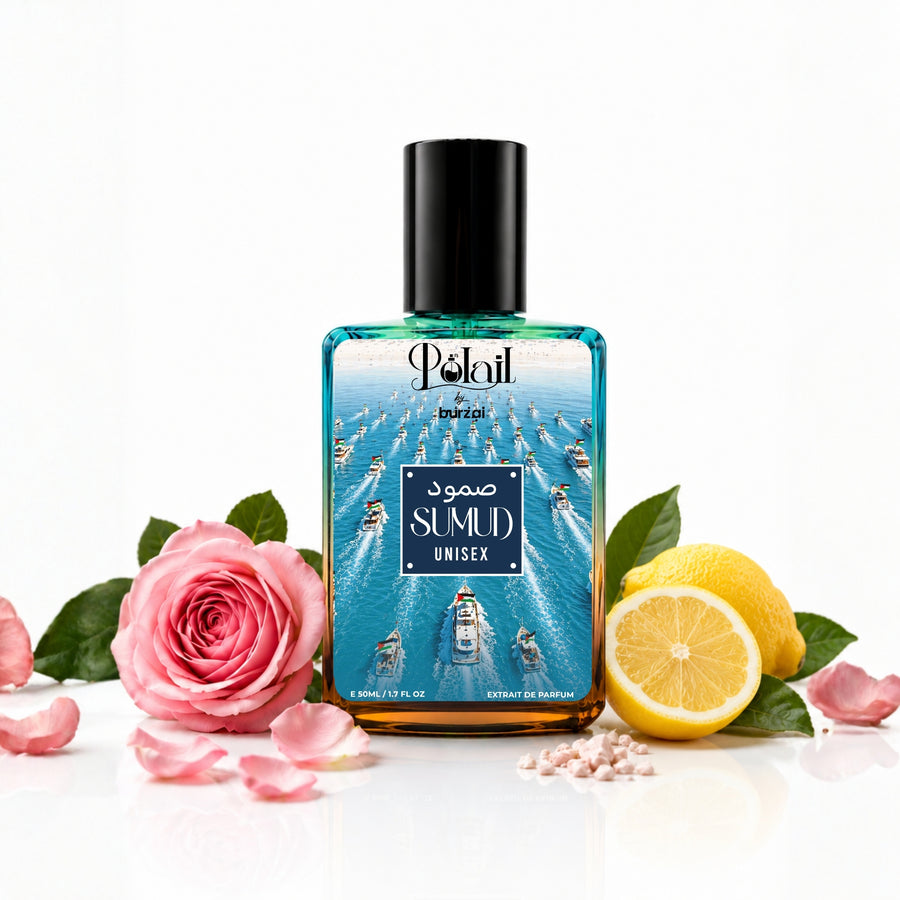 A rectangular perfume bottle with a black cap and a blue illustrated label reading 'SUMID UNISEX,' styled on a white surface with a pink rose, lemon halves, petals, and green leaves around it.