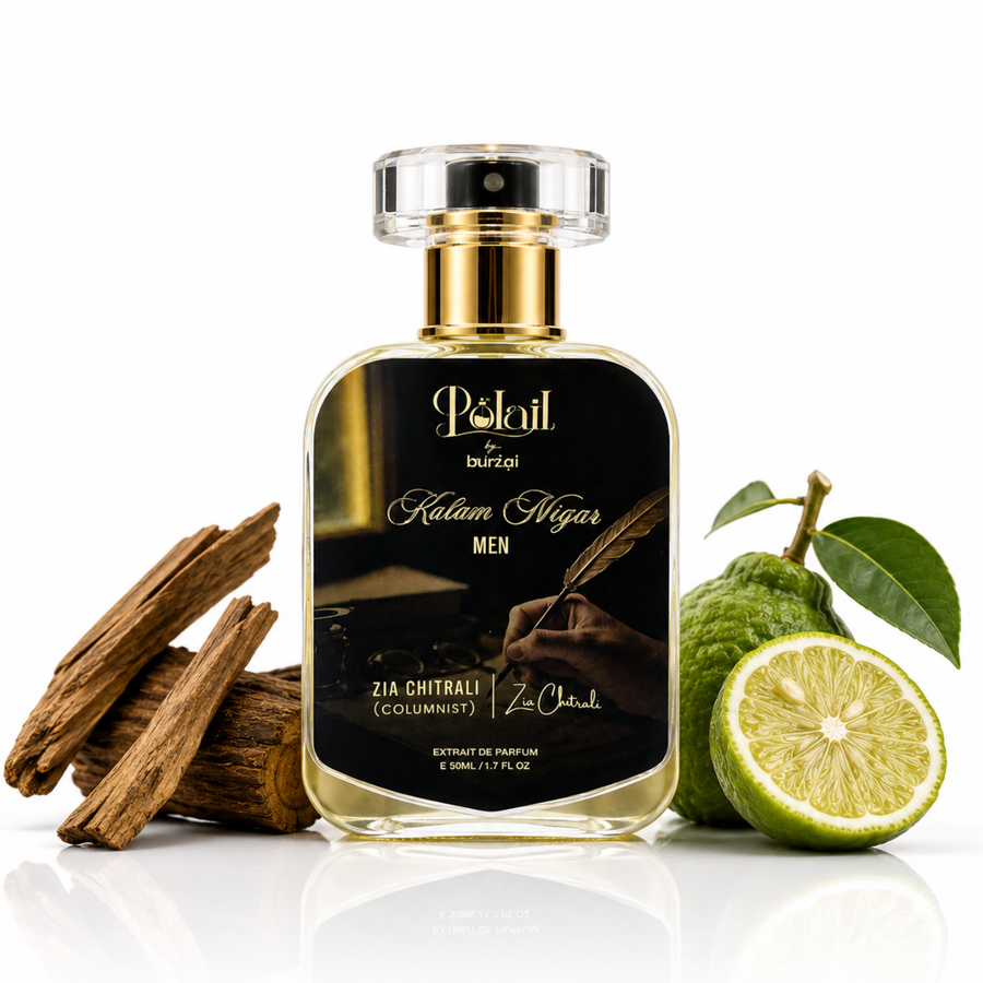 A bottle of Polail by burzai kalam nigar men perfume, styled with a cinnamon stick, a green quinine fruit, and a lime slice on a reflective white surface.